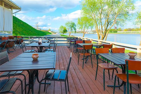 urban riverfront cafes and green trees Stock Photo - Budget Royalty-Free & Subscription, Code: 400-07749511