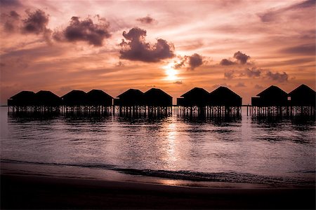 simsearch:400-05184992,k - Maldives  sunset with water villas silhouette Stock Photo - Budget Royalty-Free & Subscription, Code: 400-07749896