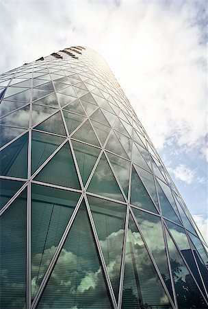 futuristic bank - modern glass and steeel office tower in the Westhafen district of Frankfurt am Main, Germany Stock Photo - Budget Royalty-Free & Subscription, Code: 400-07754708