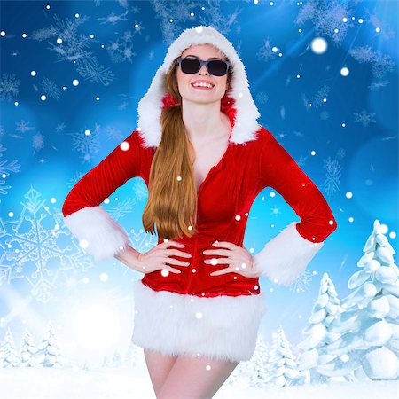 simsearch:400-07755560,k - Cool santa girl wearing sunglasses against snowy landscape with fir trees Stock Photo - Budget Royalty-Free & Subscription, Code: 400-07755559