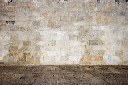 empty street wall - Tiled wall with a old blank stone bricks Stock Photo - Budget Royalty-Free & Subscription, Code: 400-07757052