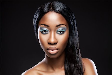 simsearch:400-07292674,k - Beautiful young black woman with makeup and long hair Photographie de stock - Aubaine LD & Abonnement, Code: 400-07759106