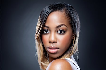 simsearch:400-07292674,k - Portrait of an young black beauty with perfect skin Photographie de stock - Aubaine LD & Abonnement, Code: 400-07759100