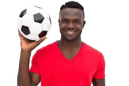 Portrait of a smiling handsome football fan over white background Stock Photo - Budget Royalty-Free & Subscription, Code: 400-07750666