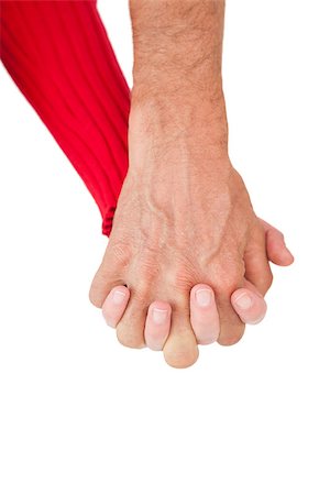 Close up of holding hands over white background Stock Photo - Budget Royalty-Free & Subscription, Code: 400-07750776