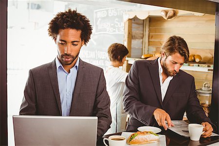 Businessmen enjoying their lunch hour at the coffee shop Stock Photo - Budget Royalty-Free & Subscription, Code: 400-07750974