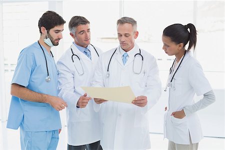 simsearch:640-03257612,k - Medical team discussing some results in an office Stock Photo - Budget Royalty-Free & Subscription, Code: 400-07752092