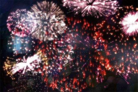 Digitally generated colourful fireworks exploding on black background Photographie de stock - Aubaine LD & Abonnement, Code: 400-07752236