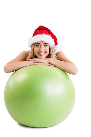 simsearch:400-07138263,k - Festive fit blonde posing with exercise ball on white background Stock Photo - Budget Royalty-Free & Subscription, Code: 400-07752553