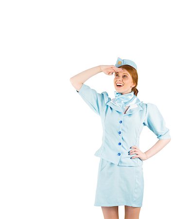 simsearch:400-07752842,k - Pretty air hostess looking up on white background Stock Photo - Budget Royalty-Free & Subscription, Code: 400-07752846