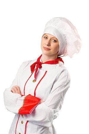 Pretty chef standing with arms crossed on white background Stock Photo - Budget Royalty-Free & Subscription, Code: 400-07752875