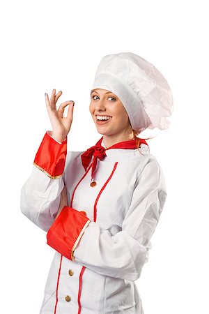 Pretty chef standing with arms crossed on white background Stock Photo - Budget Royalty-Free & Subscription, Code: 400-07752877