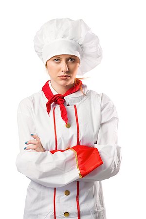 Pretty chef standing with arms crossed on white background Stock Photo - Budget Royalty-Free & Subscription, Code: 400-07752880