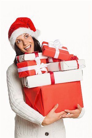 simsearch:400-07753751,k - Smiling woman with christmas presents on a white background Stock Photo - Budget Royalty-Free & Subscription, Code: 400-07752901