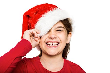 school kid cutout - Festive little girl smiling at camera on white background Stock Photo - Budget Royalty-Free & Subscription, Code: 400-07753128