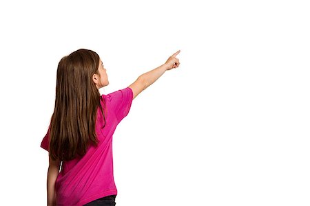 preteens fingering - Cute little girl pointing with finger on white background Stock Photo - Budget Royalty-Free & Subscription, Code: 400-07753196