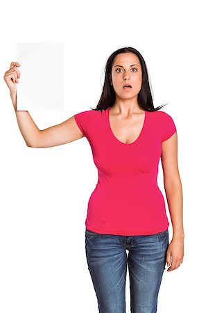 studio portrait attractive woman surprised - Shocked woman holding piece of paper on white background Stock Photo - Budget Royalty-Free & Subscription, Code: 400-07753406