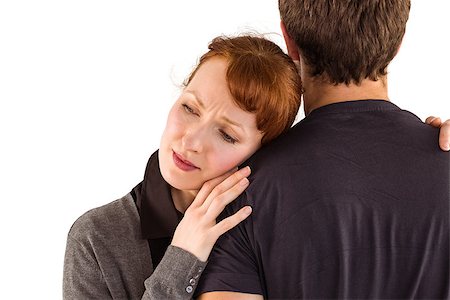 simsearch:400-07833287,k - Scared woman holding onto man on white background Stock Photo - Budget Royalty-Free & Subscription, Code: 400-07753560