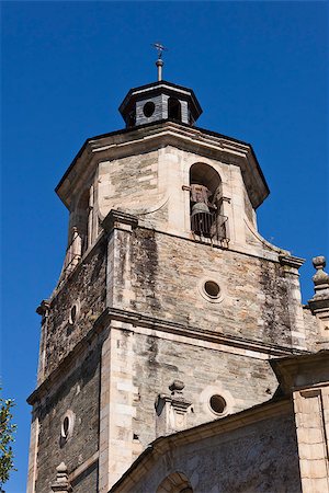 photojope (artist) - Bell tower in the Collegiate Church of Santa Maria in Villafranca del Bierzo, Castile y Leon, Spain. Fotografie stock - Microstock e Abbonamento, Codice: 400-07753784