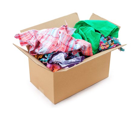 colored clothing in a box on an isolated white background Stock Photo - Budget Royalty-Free & Subscription, Code: 400-07774056