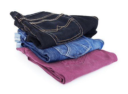 simsearch:400-07770314,k - Lot of different blue jeans isolated on white Stock Photo - Budget Royalty-Free & Subscription, Code: 400-07774146