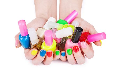 Multi-colored jelly sweets in the hands with a bright nail polish Photographie de stock - Aubaine LD & Abonnement, Code: 400-07774221