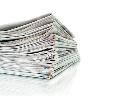 Closeup of stack of newspapers Stock Photo - Budget Royalty-Free & Subscription, Code: 400-07774295
