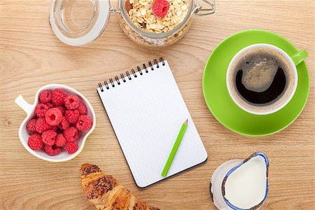 simsearch:400-08113690,k - Healthy breakfast with muesli, berries and milk. On wooden table with notepad for copy space Stock Photo - Budget Royalty-Free & Subscription, Code: 400-07776907