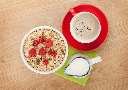 simsearch:400-08113690,k - Healthy breakfast with muesli. View from above on wooden table Stock Photo - Budget Royalty-Free & Subscription, Code: 400-07776908