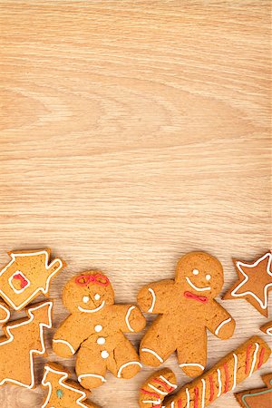 simsearch:400-07175496,k - Homemade various christmas gingerbread cookies on wooden background with copy space Fotografie stock - Microstock e Abbonamento, Codice: 400-07776928