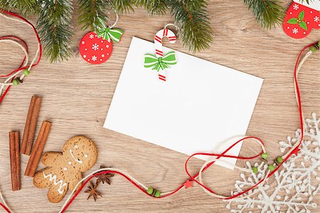 simsearch:400-07299371,k - Christmas fir tree, gingerbread cookies and card for copy space on wooden table Foto de stock - Super Valor sin royalties y Suscripción, Código: 400-07776923