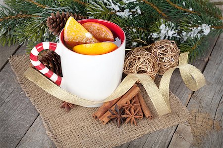 Christmas mulled wine with fir tree and decor on wooden table Stock Photo - Budget Royalty-Free & Subscription, Code: 400-07777020