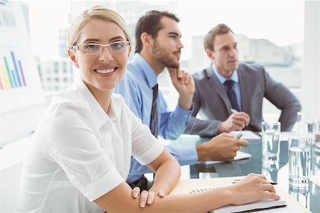 simsearch:400-06929754,k - Portrait of young business people in board room meeting at office Stockbilder - Microstock & Abonnement, Bildnummer: 400-07777963