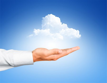 simsearch:400-05914602,k - Cloud computing, close up of male hand holding cloud with copy space Stockbilder - Microstock & Abonnement, Bildnummer: 400-07779396