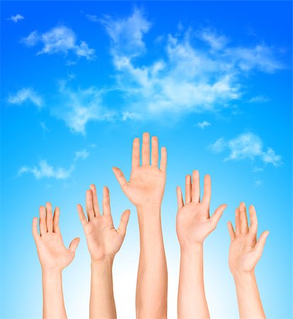 raising hand in a crowd - many open hands raised up against the sky,business concept Stock Photo - Budget Royalty-Free & Subscription, Code: 400-07779566