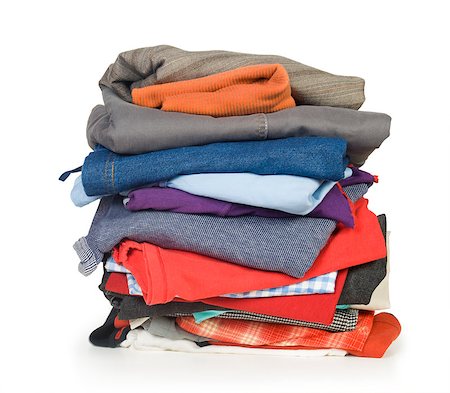 shirt folded - pile of clothing isolated on white Stock Photo - Budget Royalty-Free & Subscription, Code: 400-07770270
