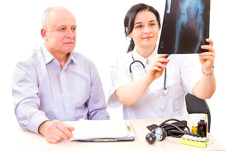 students in the hospital talking - Women doctor showing a x-ray image to the patient. Stock Photo - Budget Royalty-Free & Subscription, Code: 400-07771190