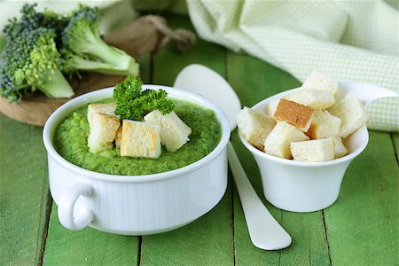 vegetable broccoli cream soup with white croutons and parsley Stock Photo - Budget Royalty-Free & Subscription, Code: 400-07771224