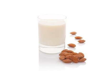 Almond milk in glass with almond nuts isolated on white background. Vegan and vegetarian milk concept. Stock Photo - Budget Royalty-Free & Subscription, Code: 400-07771440