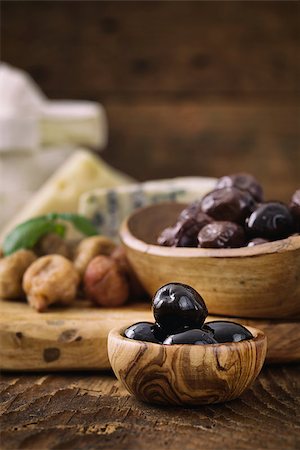 simsearch:400-05666507,k - Black olives , herbs and cheese on wood Stock Photo - Budget Royalty-Free & Subscription, Code: 400-07772179