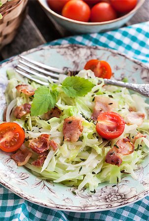 red cabbages harvesting - Braised cabbage with bacon and thyme for dinner Stock Photo - Budget Royalty-Free & Subscription, Code: 400-07772598