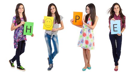 Teenager girl showing the text hope on paper Stock Photo - Budget Royalty-Free & Subscription, Code: 400-07772610