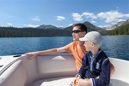 sailing family - family of two enjoying boat ride at lake tahoe, california/nevada state Stock Photo - Budget Royalty-Free & Subscription, Code: 400-07772676