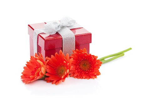 simsearch:400-07662543,k - Orange gerbera flowers and red gift box. Isolated on white background Stock Photo - Budget Royalty-Free & Subscription, Code: 400-07773126