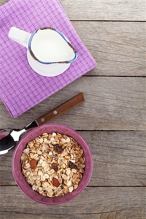 simsearch:400-08113690,k - Healthy breakfast with muesli and milk. View from above on wooden table with copy space Stock Photo - Budget Royalty-Free & Subscription, Code: 400-07773150
