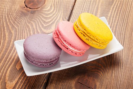 simsearch:400-06564979,k - Colorful macaron cookies on wooden table background Stock Photo - Budget Royalty-Free & Subscription, Code: 400-07773264