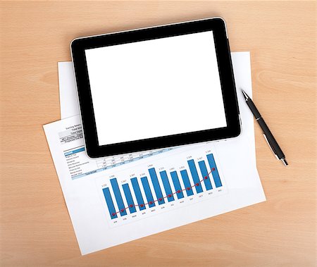 simsearch:400-08530598,k - Tablet with blank screen over papers with numbers and charts. View from above Stock Photo - Budget Royalty-Free & Subscription, Code: 400-07773288
