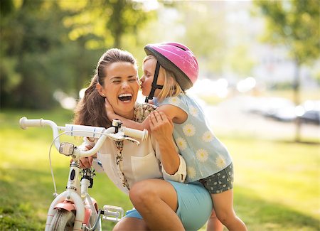 funny bikers pictures - Happy mother and baby girl having fun in park with bicycle Stock Photo - Budget Royalty-Free & Subscription, Code: 400-07794028