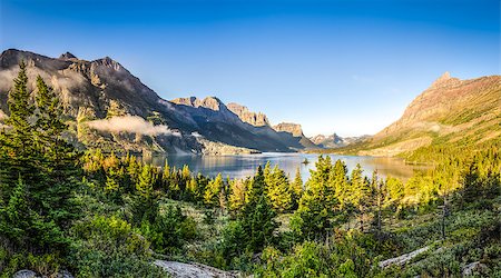 Panoramic landscape view of Glacier NP mountain range and lake, Montana, USA Foto de stock - Super Valor sin royalties y Suscripción, Código: 400-07794088