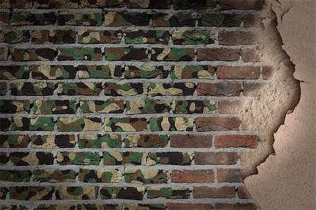 Dark brick wall texture with plaster - flag painted on wall - Army camouflage Stock Photo - Budget Royalty-Free & Subscription, Code: 400-07794190